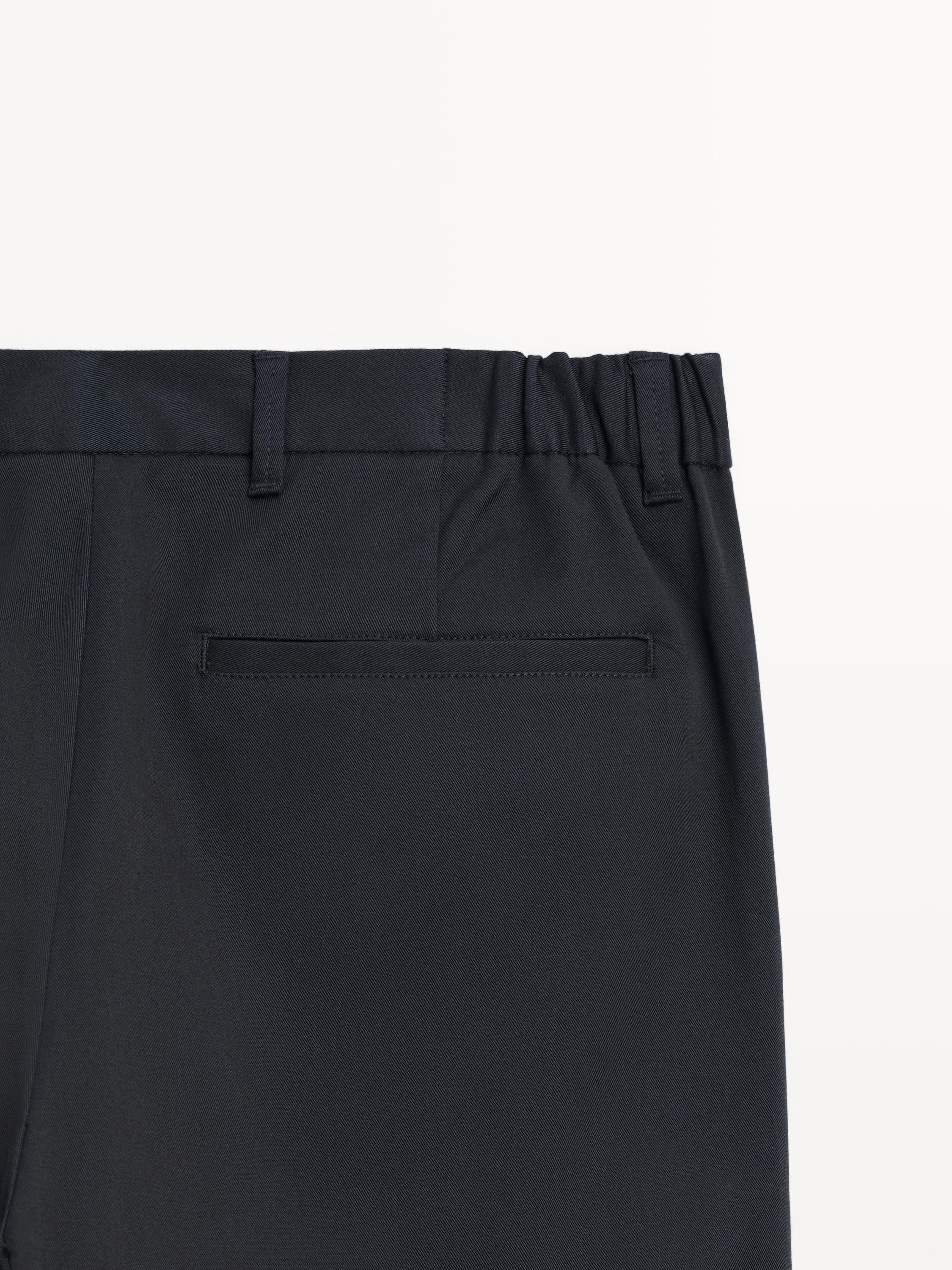 Pantalon tapered fit en coton mélang